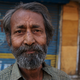 Hiralal was quietly watching me photograph someone else. When I finished, he nodded at me. And when I took his picture, he told me he was a retired postal worker.